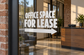 Office space for lease vinyl directional decal with right arrow on glass