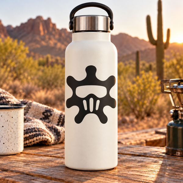 White bottle with black paintball splat mask vinyl decal on the front