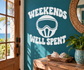 Vinyl decal with white paintball mask icon and 'Weekends Well Spent' lettering