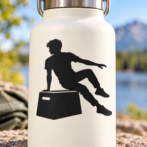 Black vinyl decal of a parkour runner doing a side vault pose on a box