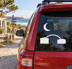 Car rear window vinyl decal with crescent moon, arch lines, and two block shapes