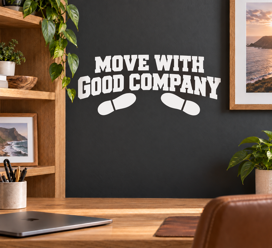 Vinyl wall decal reading 'MOVE WITH GOOD COMPANY' with swoosh icons