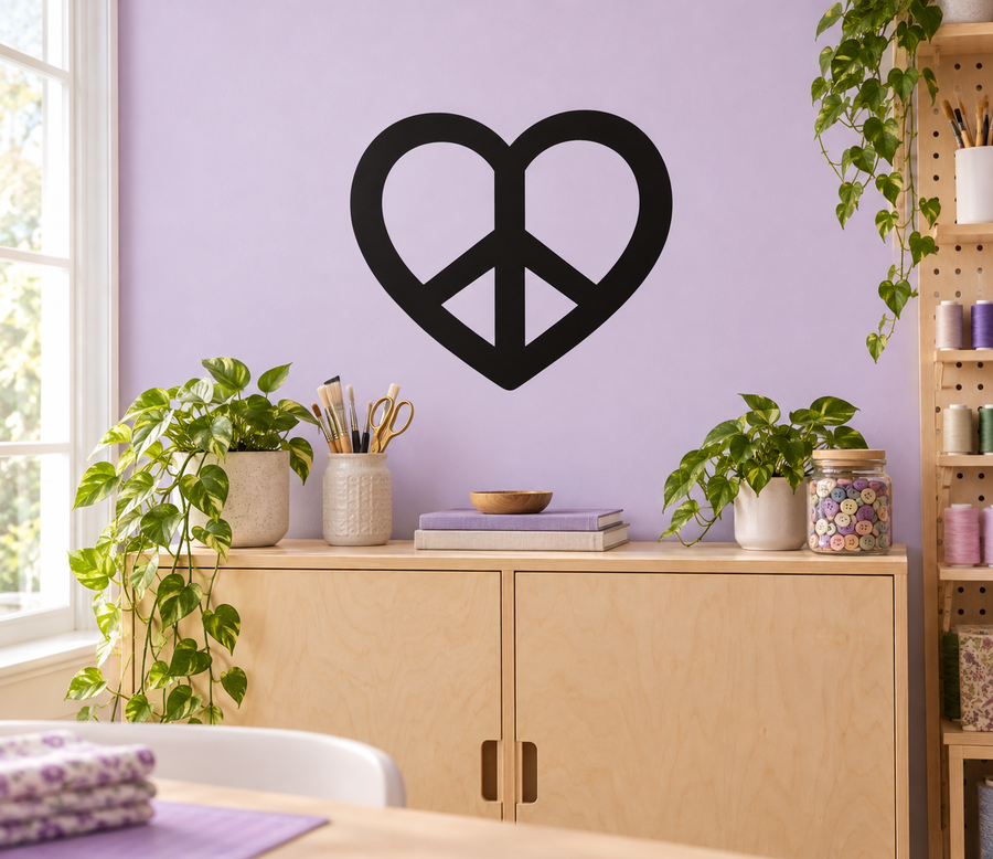Black vinyl decal of a peace symbol inside a heart shape