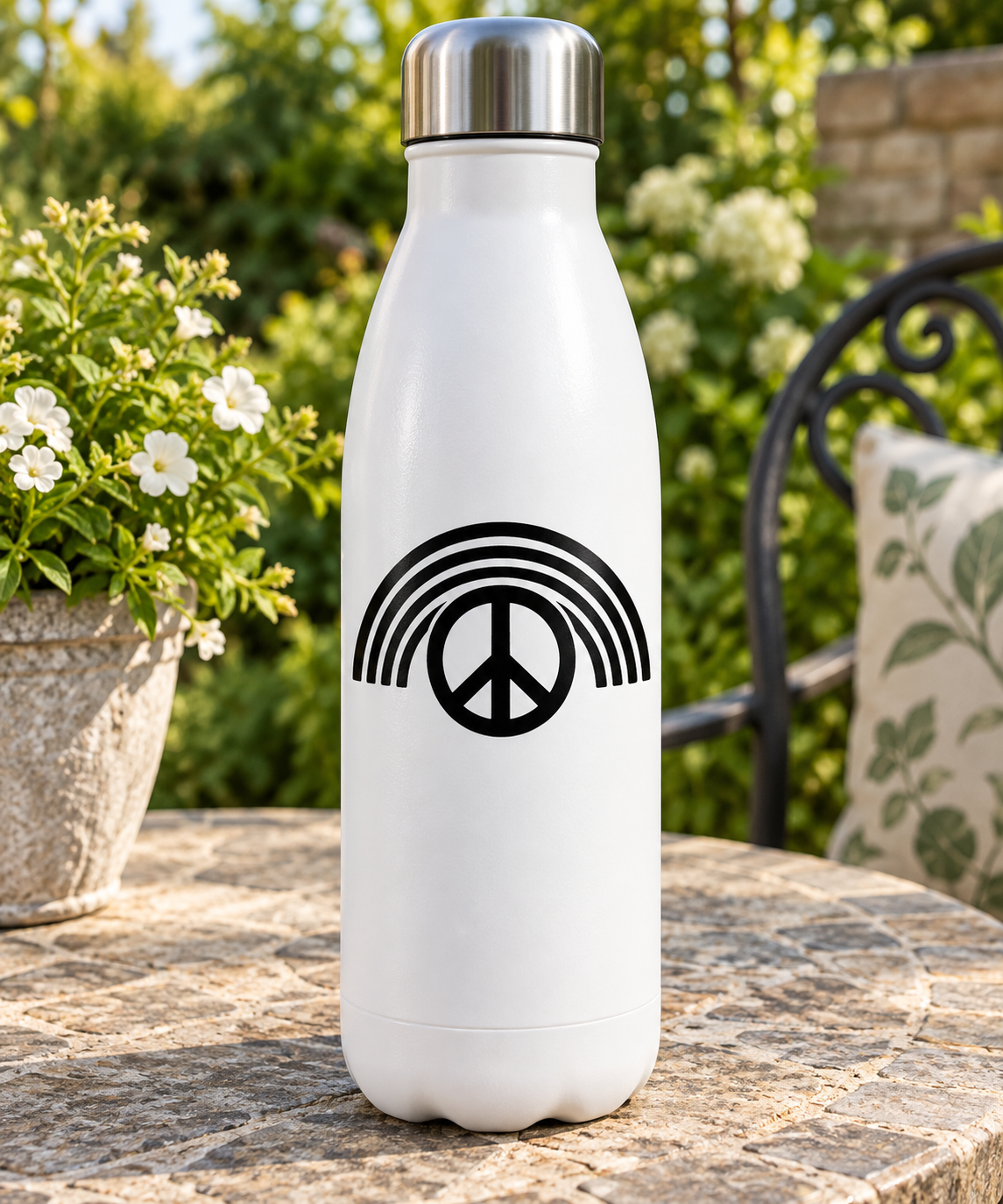 White bottle with black vinyl decal featuring peace symbol and concentric rainbow arcs