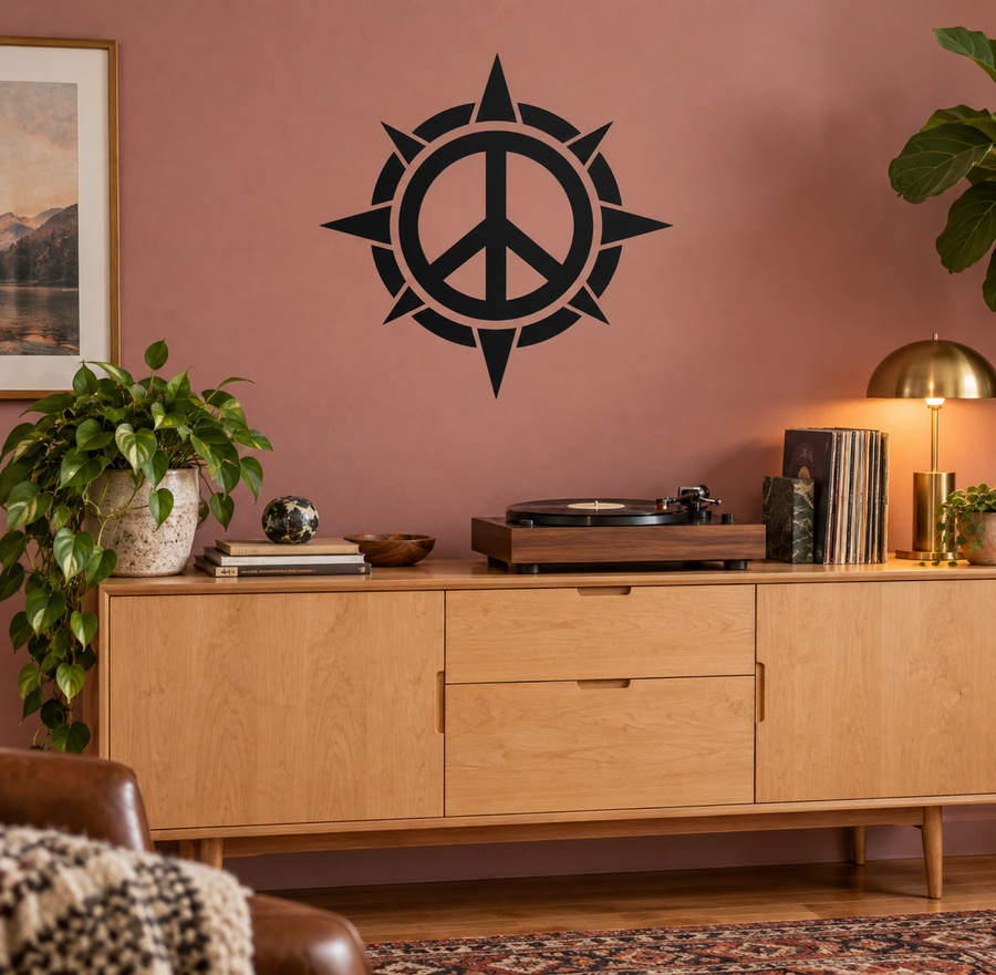 Black peace symbol and compass vinyl decal on a wall