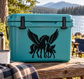 Black pegasus and foal vinyl decal on teal cooler, wings spread.