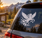 White pegasus vinyl decal with autumn leaves on a car window