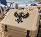 Phoenix flame emblem vinyl decal, black phoenix with wings and flames on tan surface
