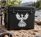 Phoenix and lotus flame vinyl decal on black surface, white wing emblem