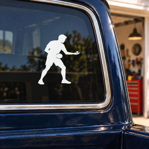 Ping pong vinyl decal of a player in a first-serve stance, white silhouette
