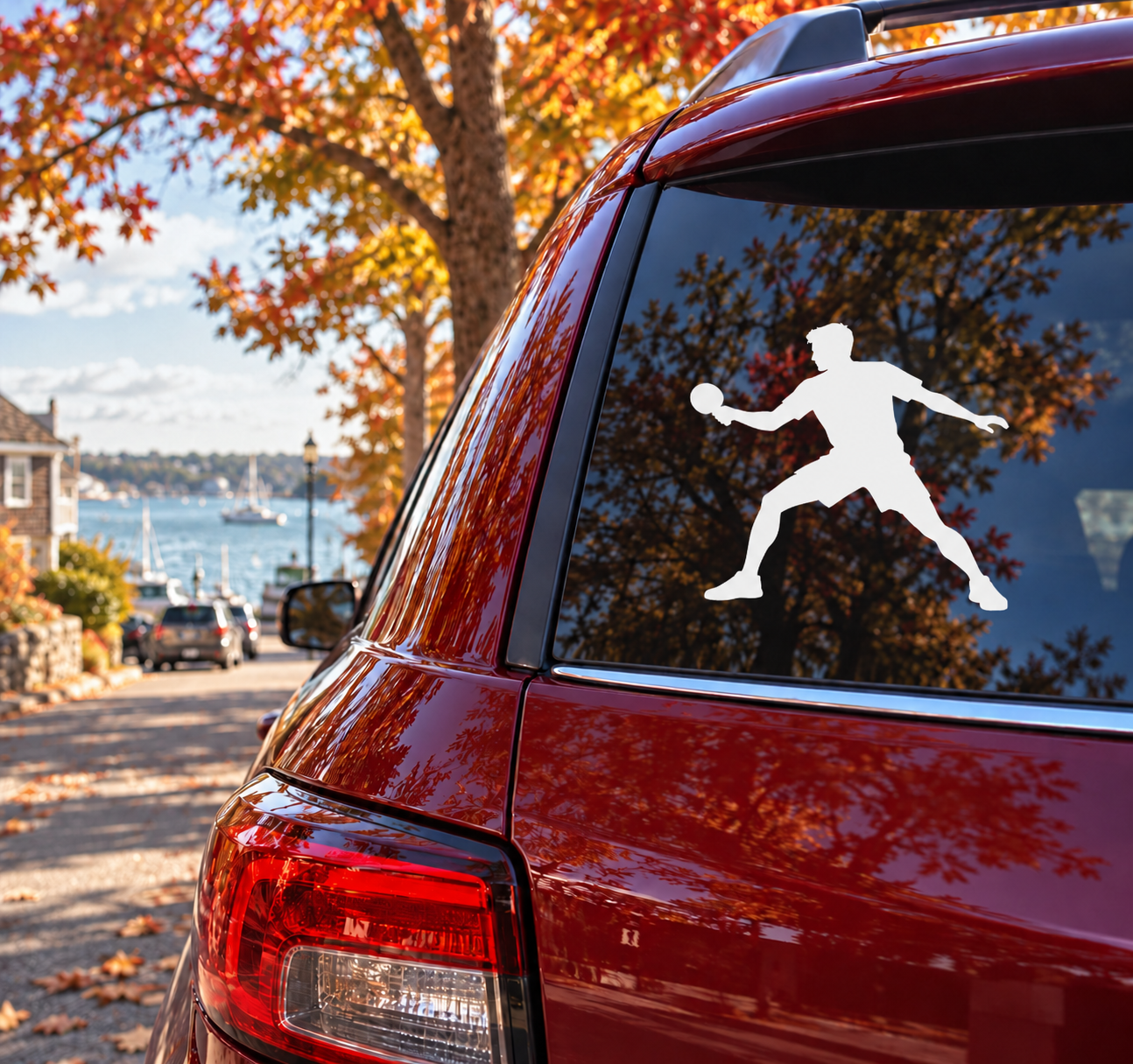 White ping pong player vinyl decal on car rear window, forehand rhythm silhouette