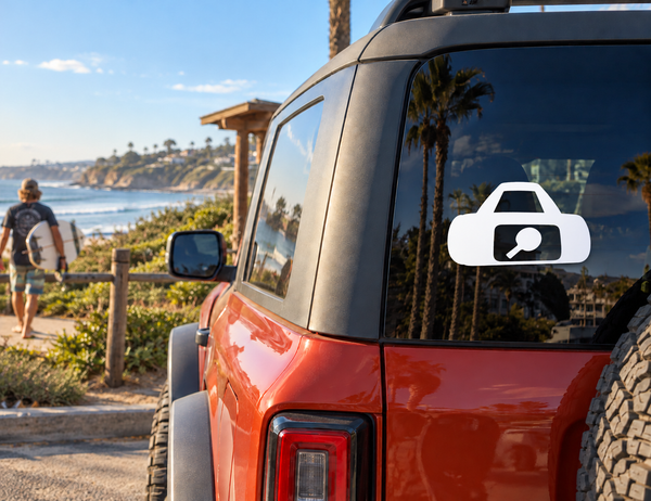 Duffel vinyl decal icon in white on a vehicle rear window