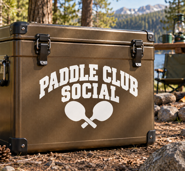 Social ping pong paddle club vinyl decal on tan cooler trunk with paddles and text