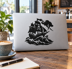 Pirate ship vinyl decal in black silhouette with skull, pirate flag, and ocean waves