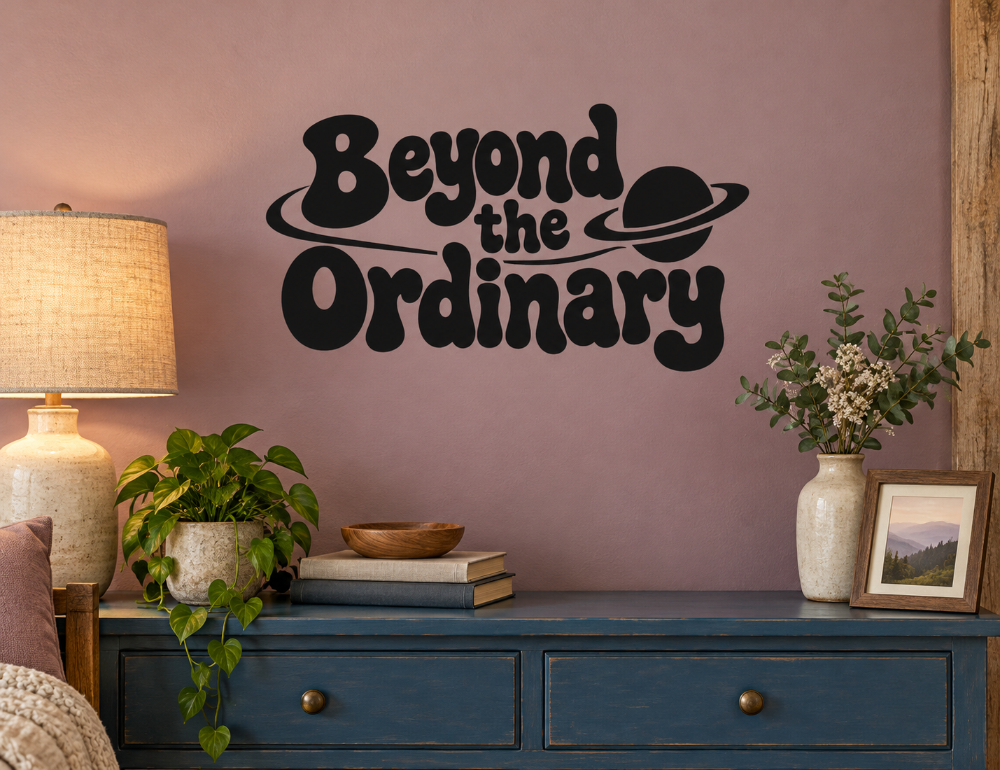Black vinyl wall decal: 'Beyond the Ordinary' with planet icon