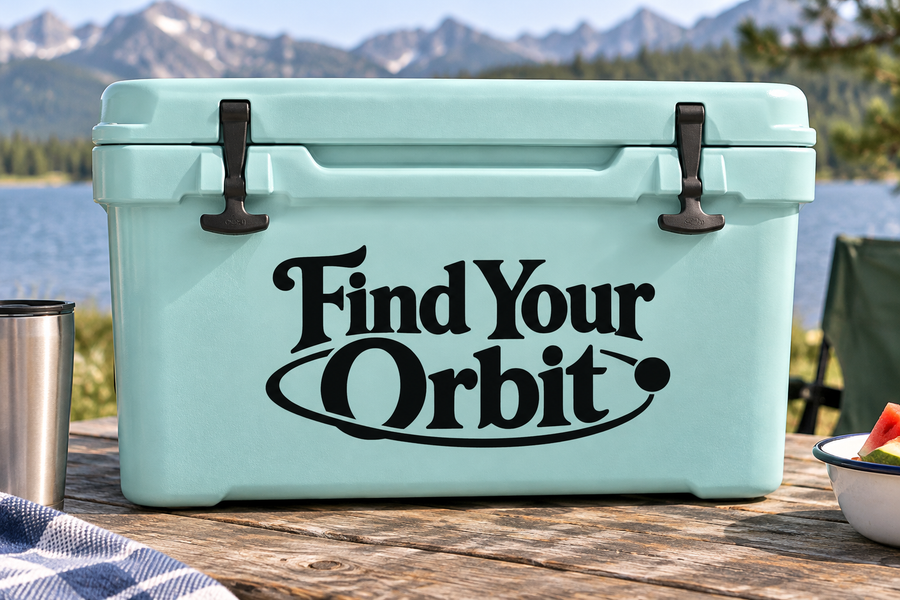 Black “Find Your Orbit” vinyl decal on a mint cooler