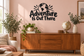 Black vinyl wall decal with globe icon and 'Adventure Is Out There' quote