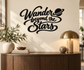 Wander beyond the Stars vinyl wall decal with planet and ring, black script