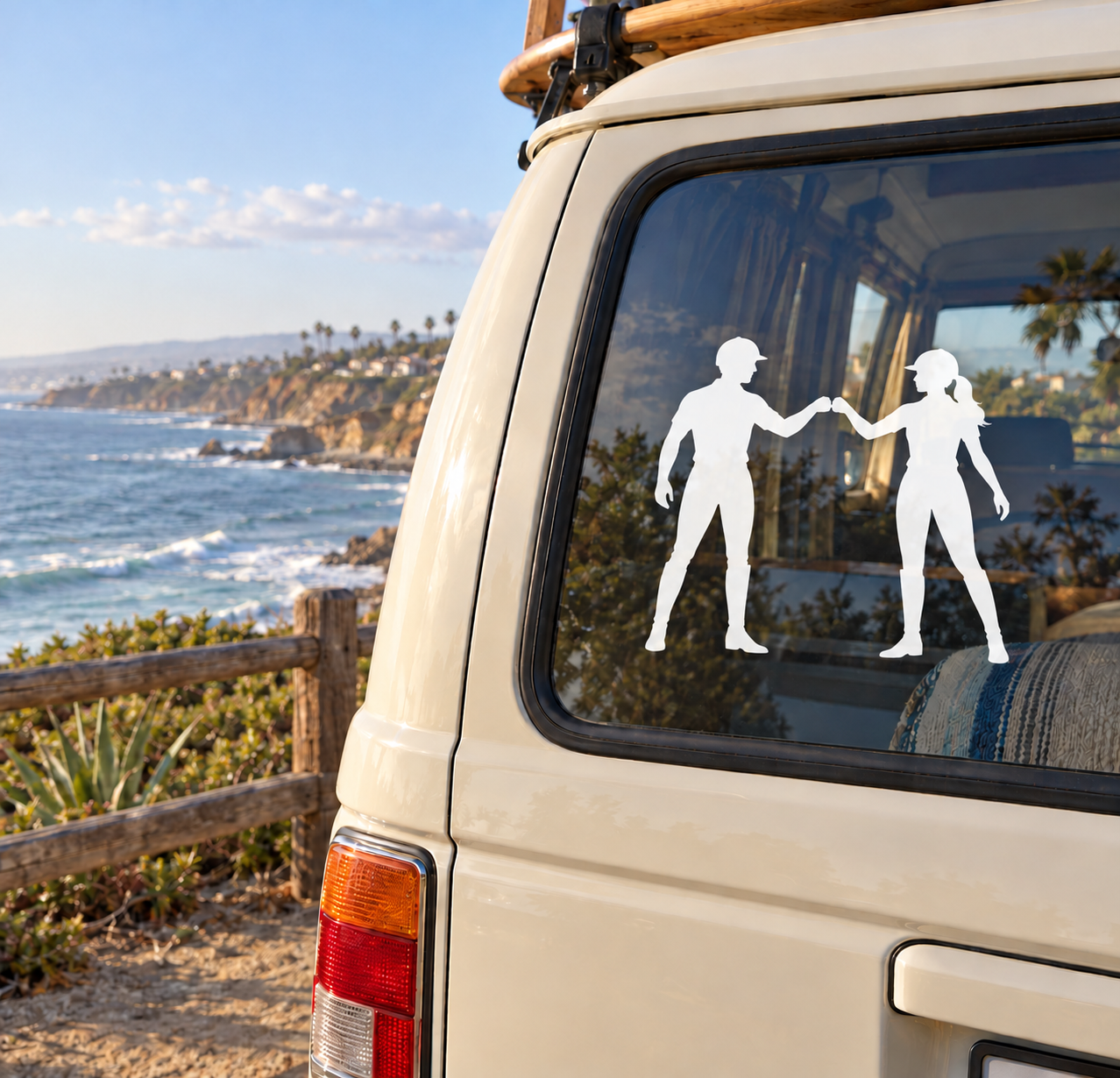 Vinyl decal of two person silhouettes with hands clasped, on car window