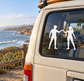 Vinyl decal of two person silhouettes with hands clasped, on car window