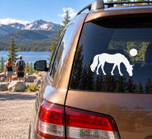 Two-horse silhouette vinyl decal on car window