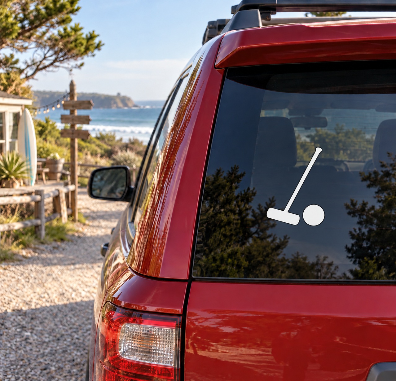 Polo mallet and ball vinyl decal on car rear window, black silhouette