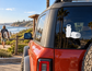 Water and towel vinyl decal on car rear window, white bottle and towel icon