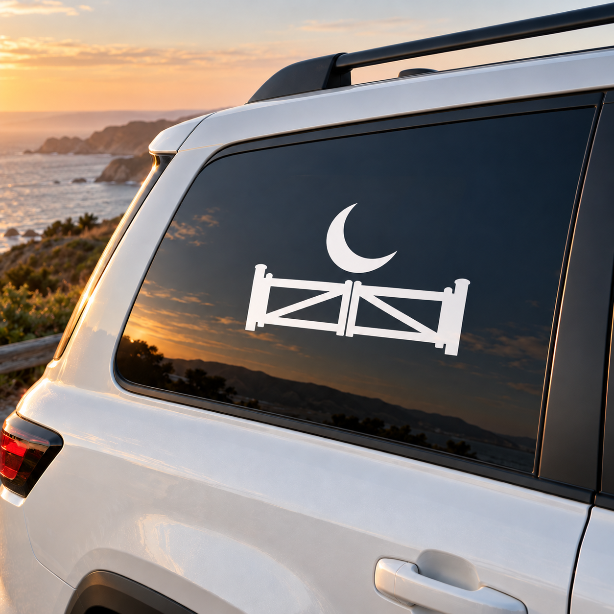 Car window vinyl decal with white crescent moon and gate barrier icon