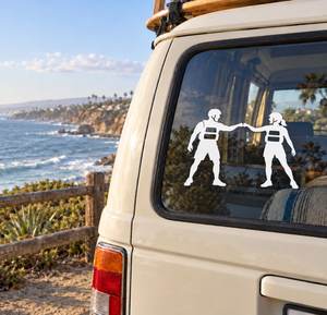 White rafting partner vinyl decal of two life-vest figures holding hands on window