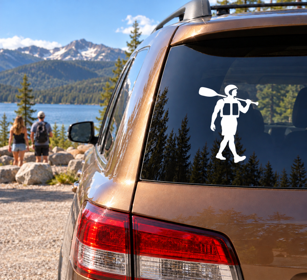 Rafting figure vinyl decal on car rear window, white silhouette holding paddle