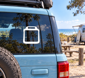 Rafting dry bag vinyl decal icon on a vehicle window, white outline