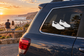 Vinyl decal of two black river shoes on a car window