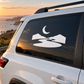 Moonlit rafting river vinyl decal on car window in white and black