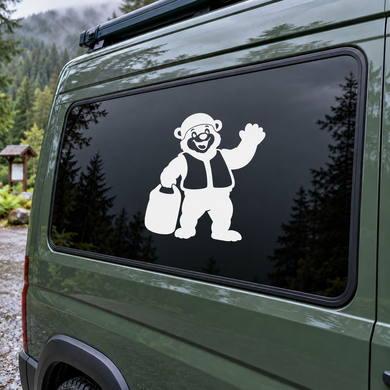 Vinyl decal of a smiling bear waving on a car window