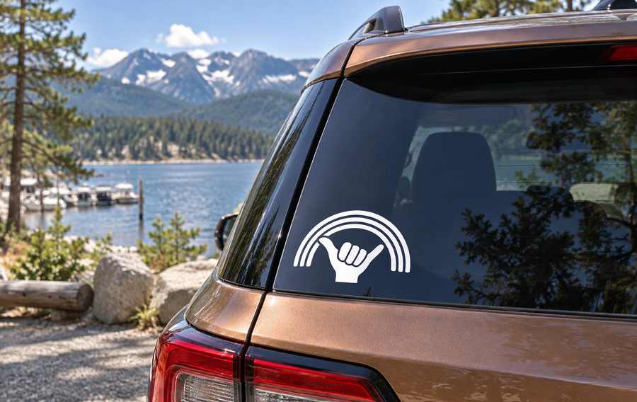 White hang-loose hand with rainbow arc vinyl decal for car window
