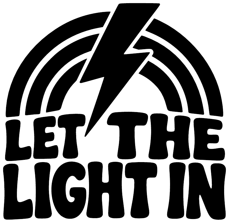 Close-up black vinyl decal with bold white “Let the Light In” lettering and bolt