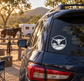 Longhorn crest vinyl decal on dark car rear window