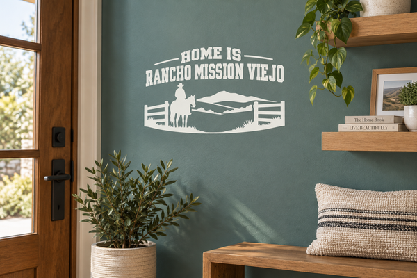 White "HOME IS RANCHO MISSION VIEJO" lettering vinyl decal with ranch silhouette