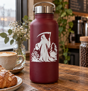 Vinyl decal graphic of a cloaked reaper with scythe and garden plants on a dark red bottle