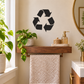 Recycling vinyl decal with three black arrows looped on a wall