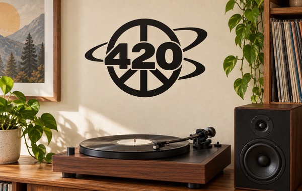 Black 420 peace-orbit vinyl decal on a wall, circular peace symbol with orbit rings