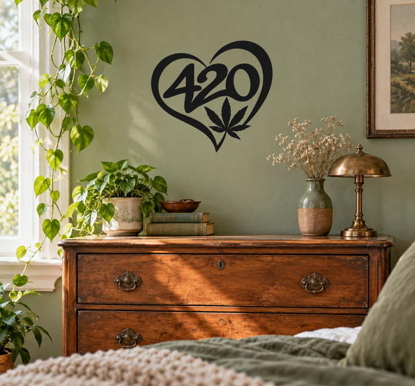 Black heart-shaped 420 vinyl decal with cannabis leaf, centered on wall