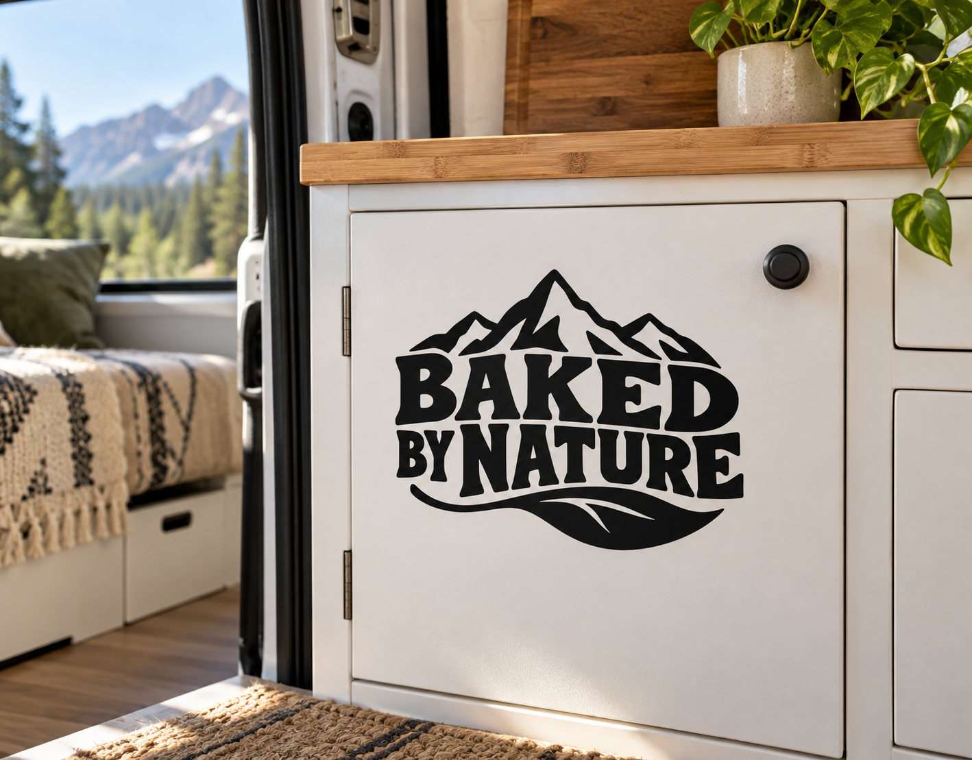 Vinyl decal featuring BAKED BY NATURE mountain logo in black lettering