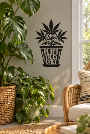 Black vinyl decal of cannabis leaves with "PLANT VIBES ONLY" text in a pot