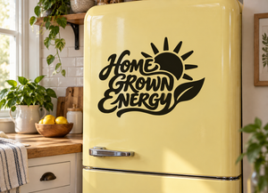 Black Home Grown Energy vinyl decal with sunburst icon on refrigerator door