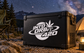 Into Orbit 420 vinyl decal with cannabis leaf logo on a black hard case