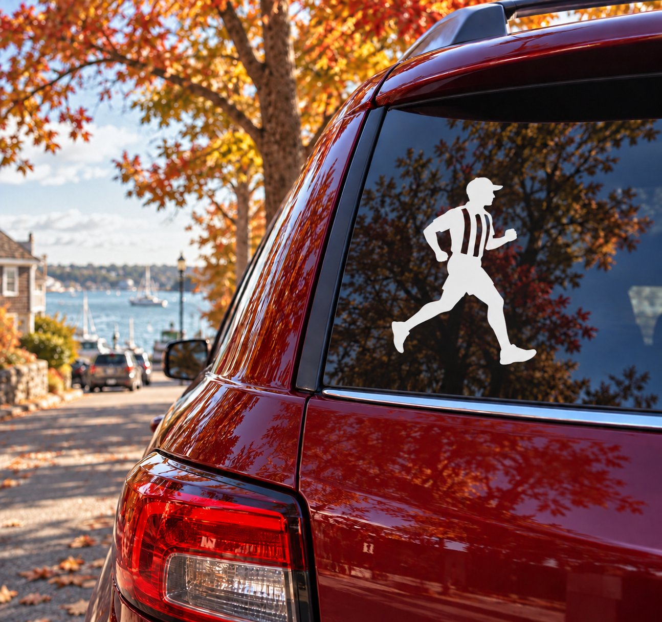 Referee vinyl decal silhouette on car window, black referee in striped shirt and cap