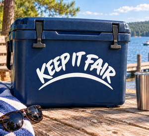 Vinyl decal with arched “KEEP IT FAIR” text on a blue rectangular surface