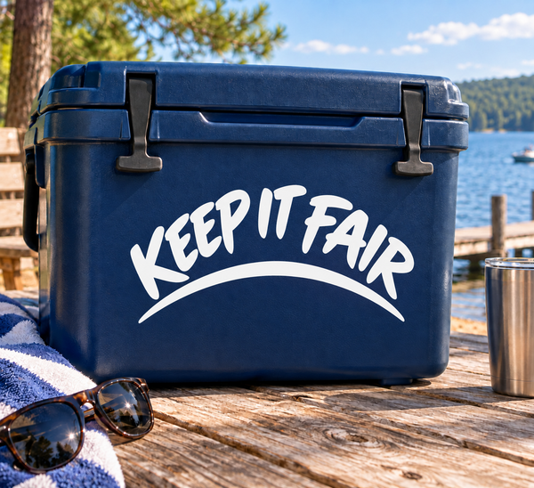 Vinyl decal with arched “KEEP IT FAIR” text on a blue rectangular surface