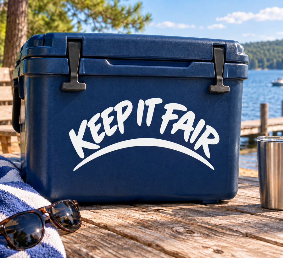 Vinyl decal with arched “KEEP IT FAIR” text on a blue rectangular surface
